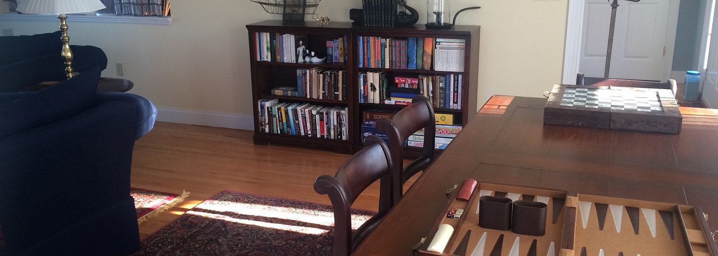 Living Room Bookshelf On Our 3 Boardwalk Cape Cod Vacation Rental
